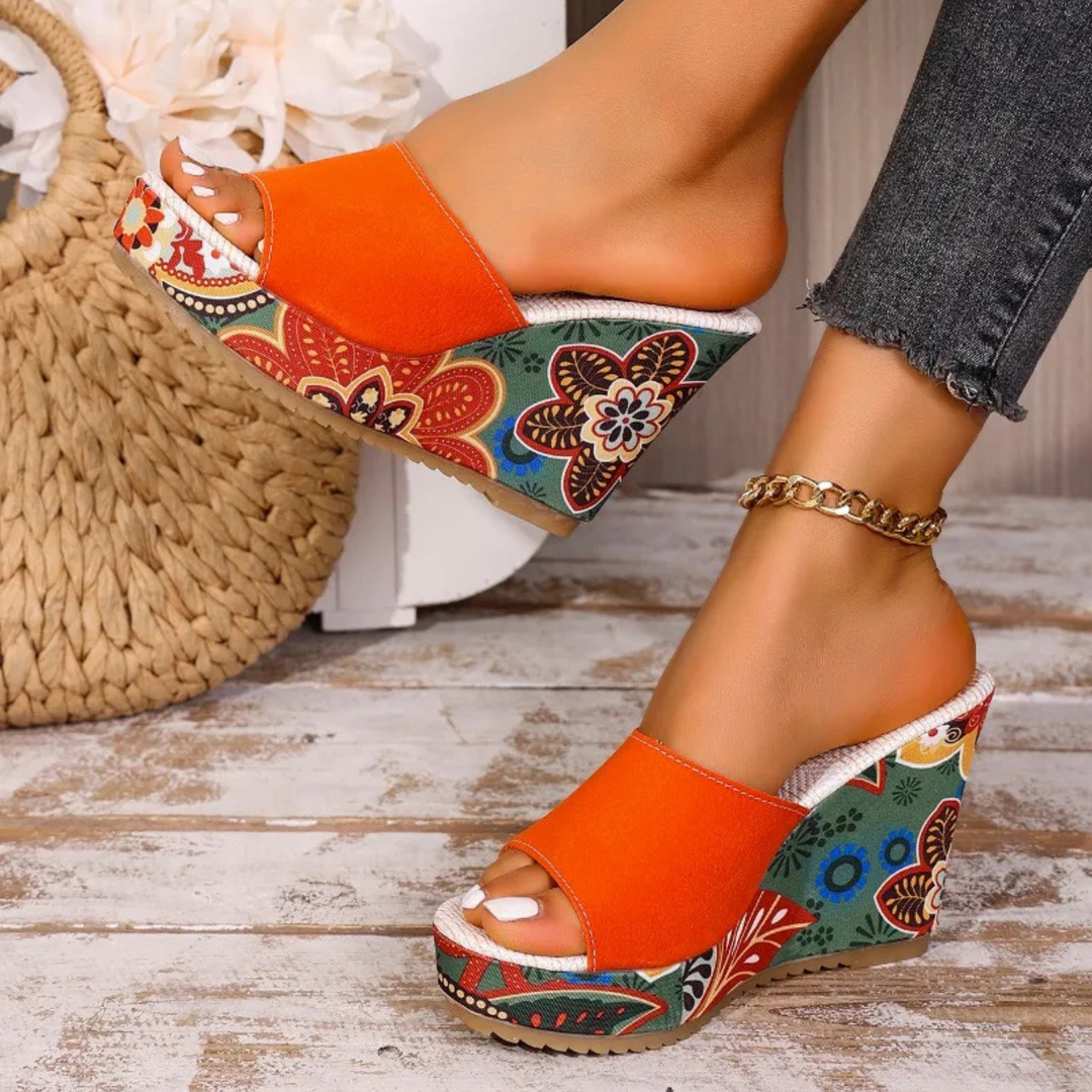 Talora - Sculptural Mules With a Floral Heel