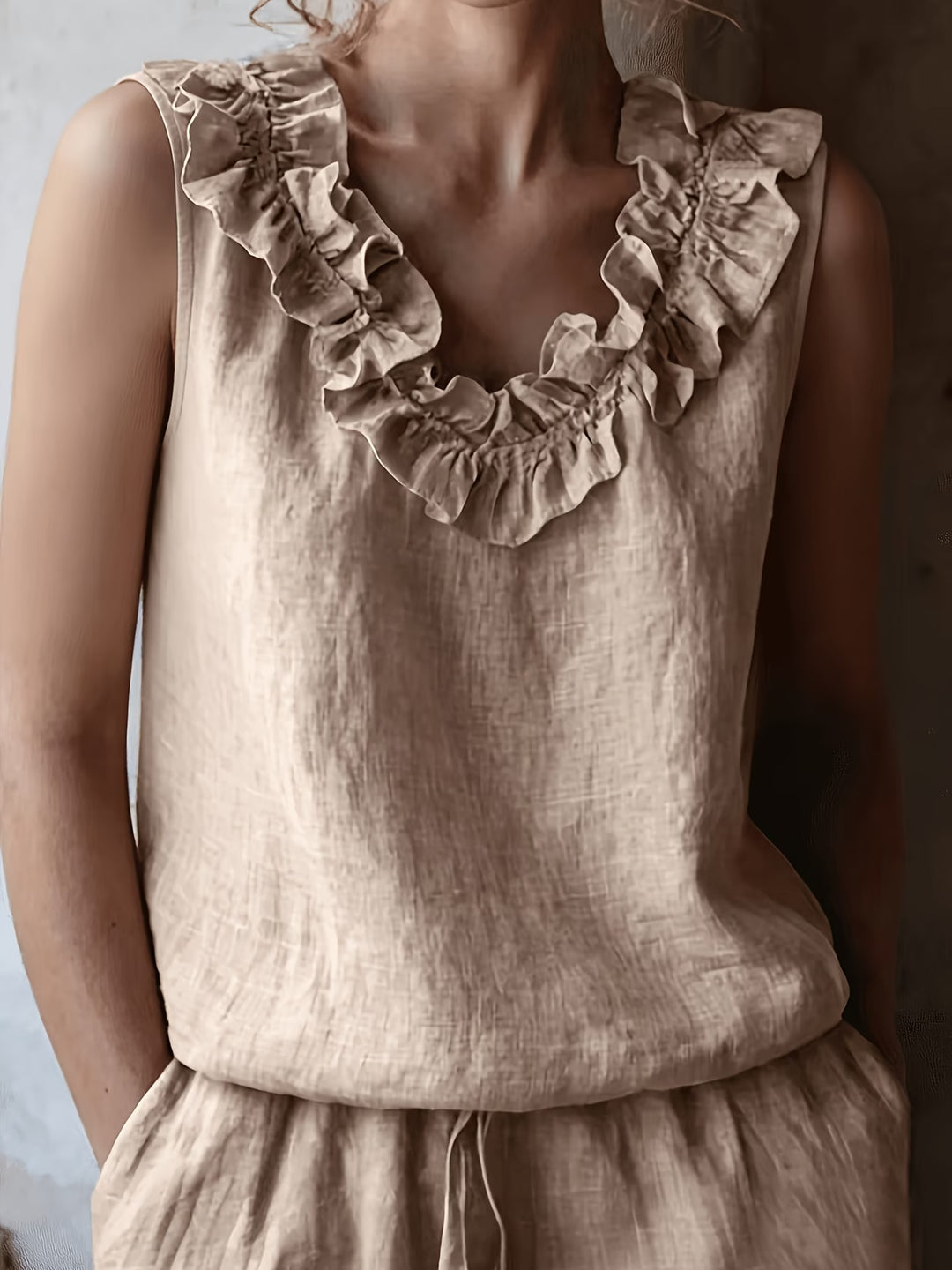 Safiya - Sleeveless Ruffle Neck Blouse