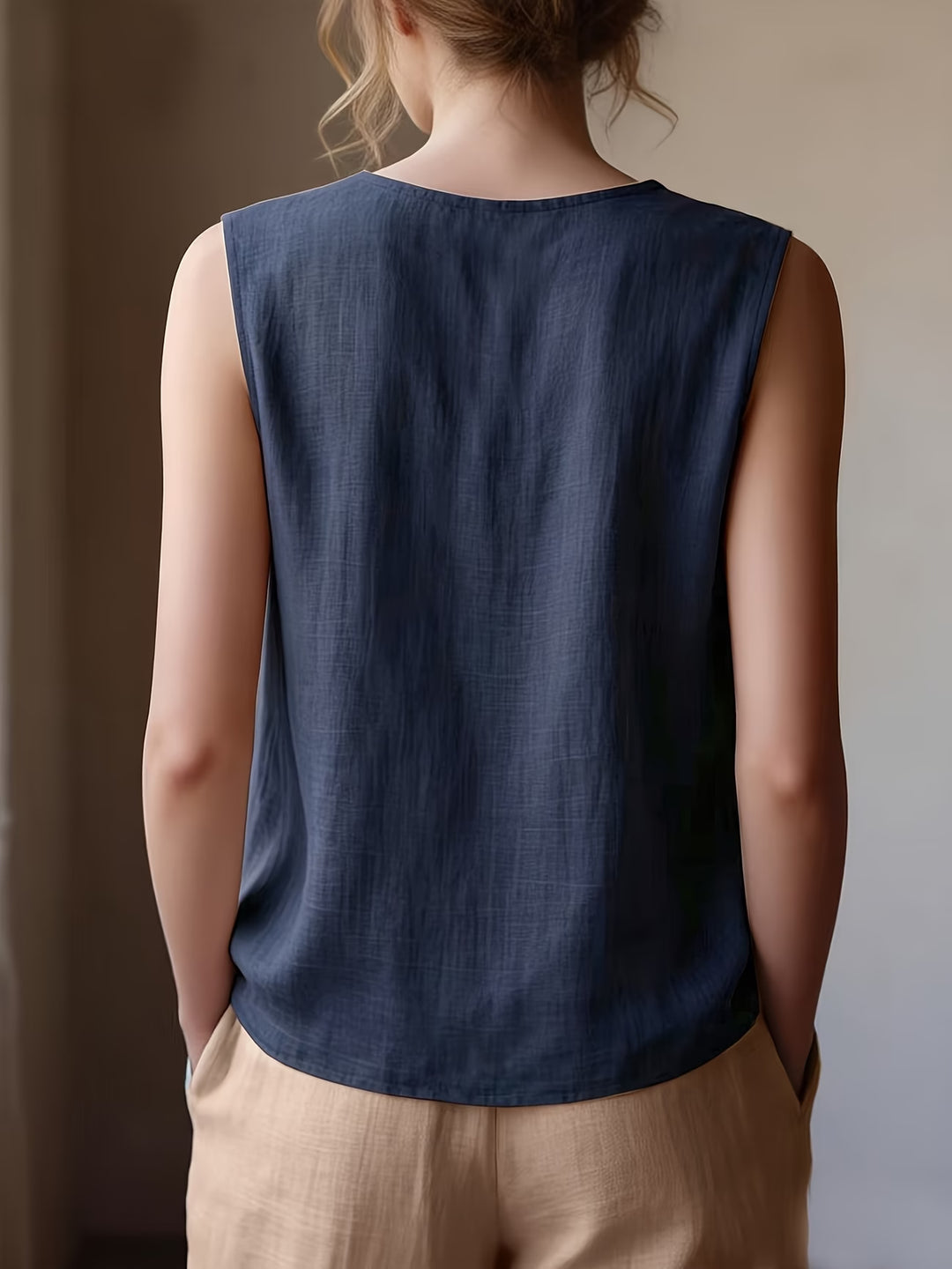 Safiya - Sleeveless Ruffle Neck Blouse