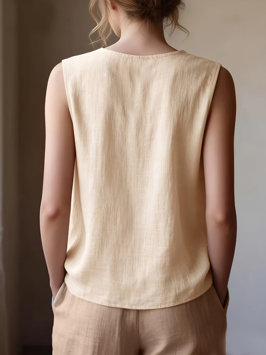 Safiya - Sleeveless Ruffle Neck Blouse